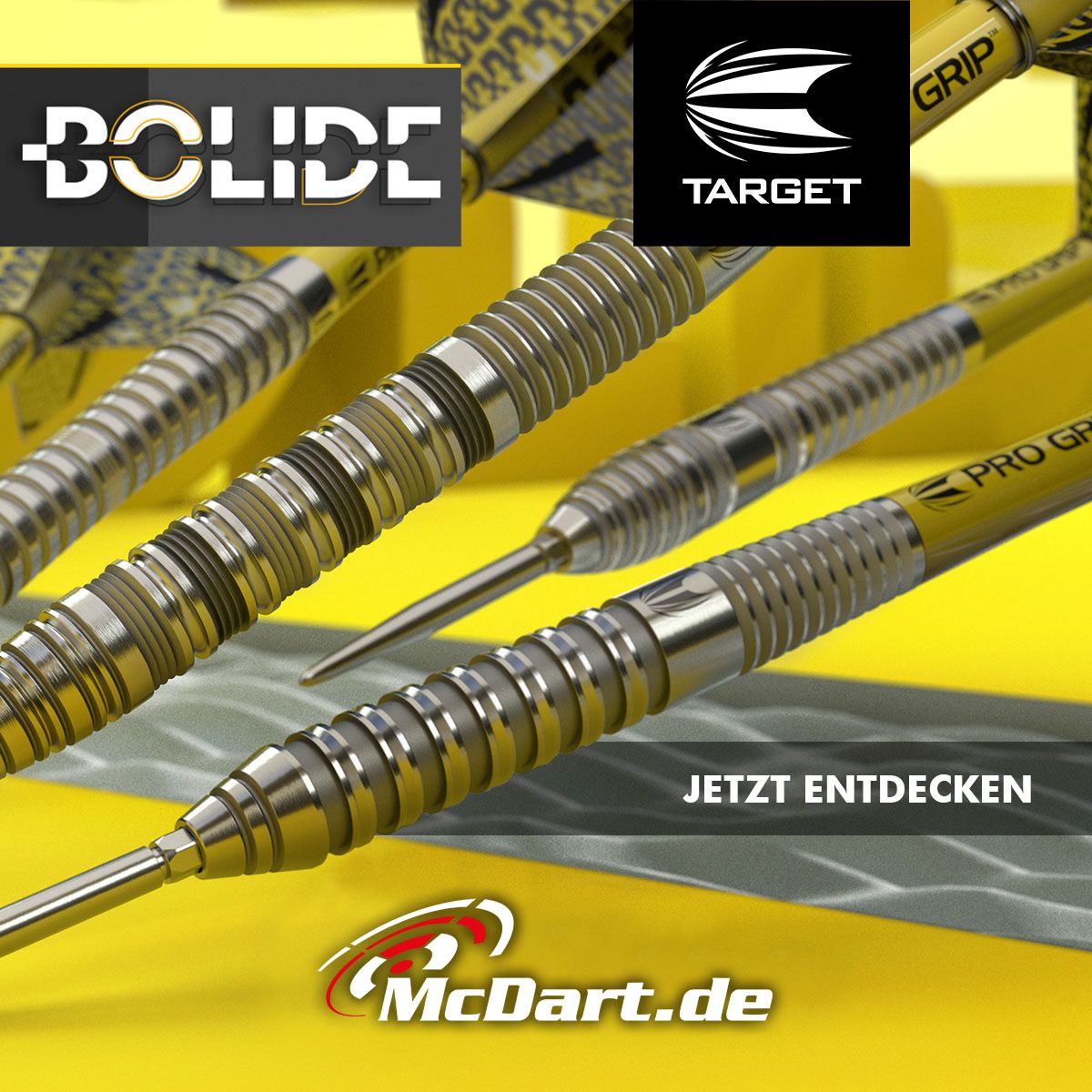 Das Bild zeigt die Target Bolide 04 Swiss Point Steeldarts mit silbernen und gelben Akzenten. Im Vordergrund steht die Aufforderung "JETZT ENTDECKEN" und das Logo von McDart.de.