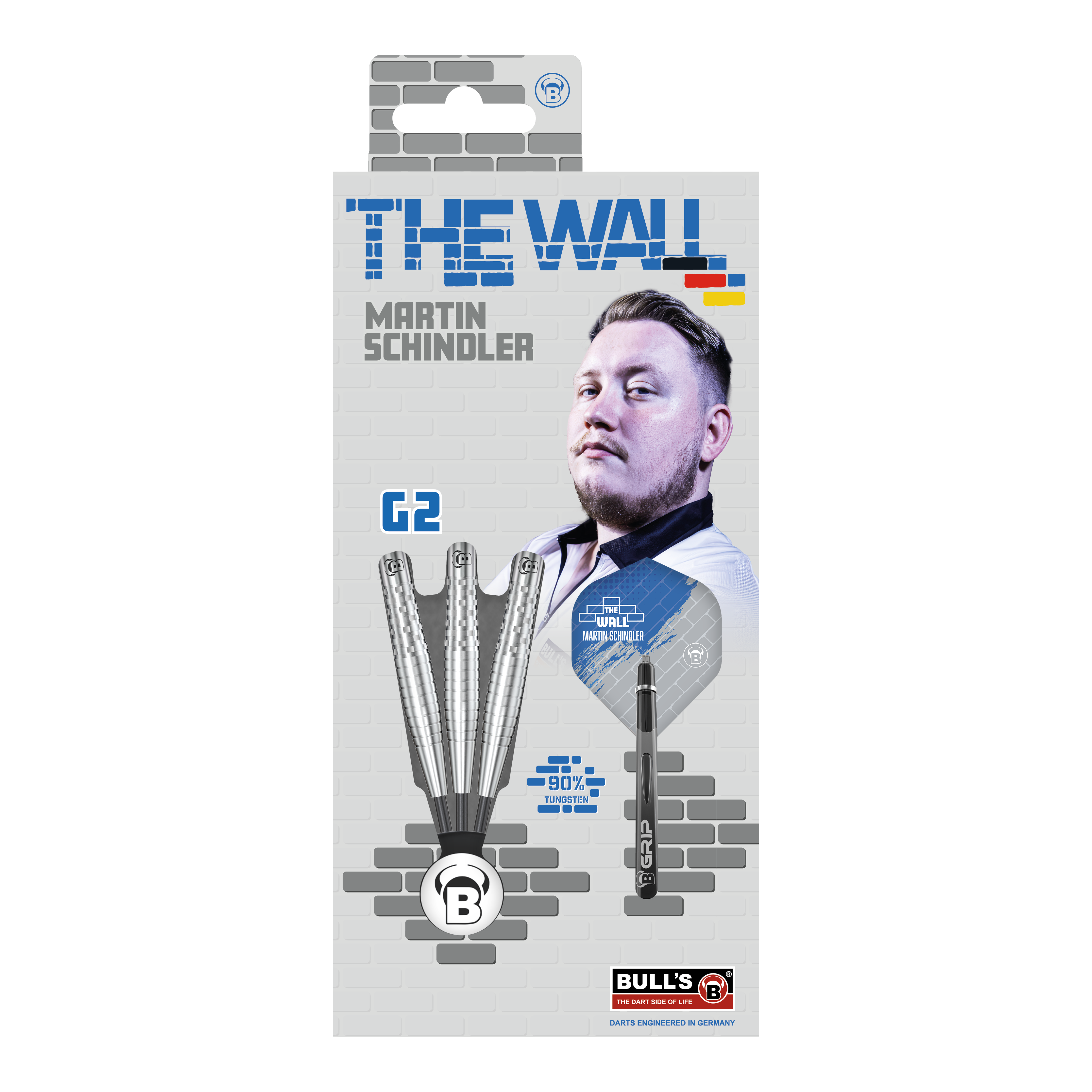 Bulls Martin Schindler Original Generation 2 Steeldarts Die Verpackung zeigt die "Bulls Martin Schindler Original Generation 2 Steeldarts" mit dem Bild von Martin Schindler. Auf der Vorderseite sind drei Darts und die Aufschrift "THE WALL" sowie "90% Tungsten" abgebildet.