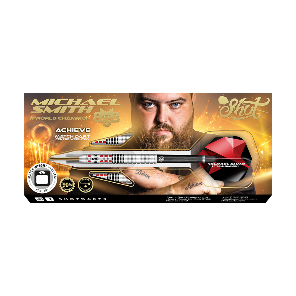 Shot Michael Smith Achieve Steeldarts Auf dem Bild ist eine Verpackung für Steeldarts mit dem Namen „Michael Smith - World Champion“ zu sehen. In der Mitte ist ein Mann mit Bart abgebildet, und ein großer silberner Dartpfeil ist prominent dargestellt.